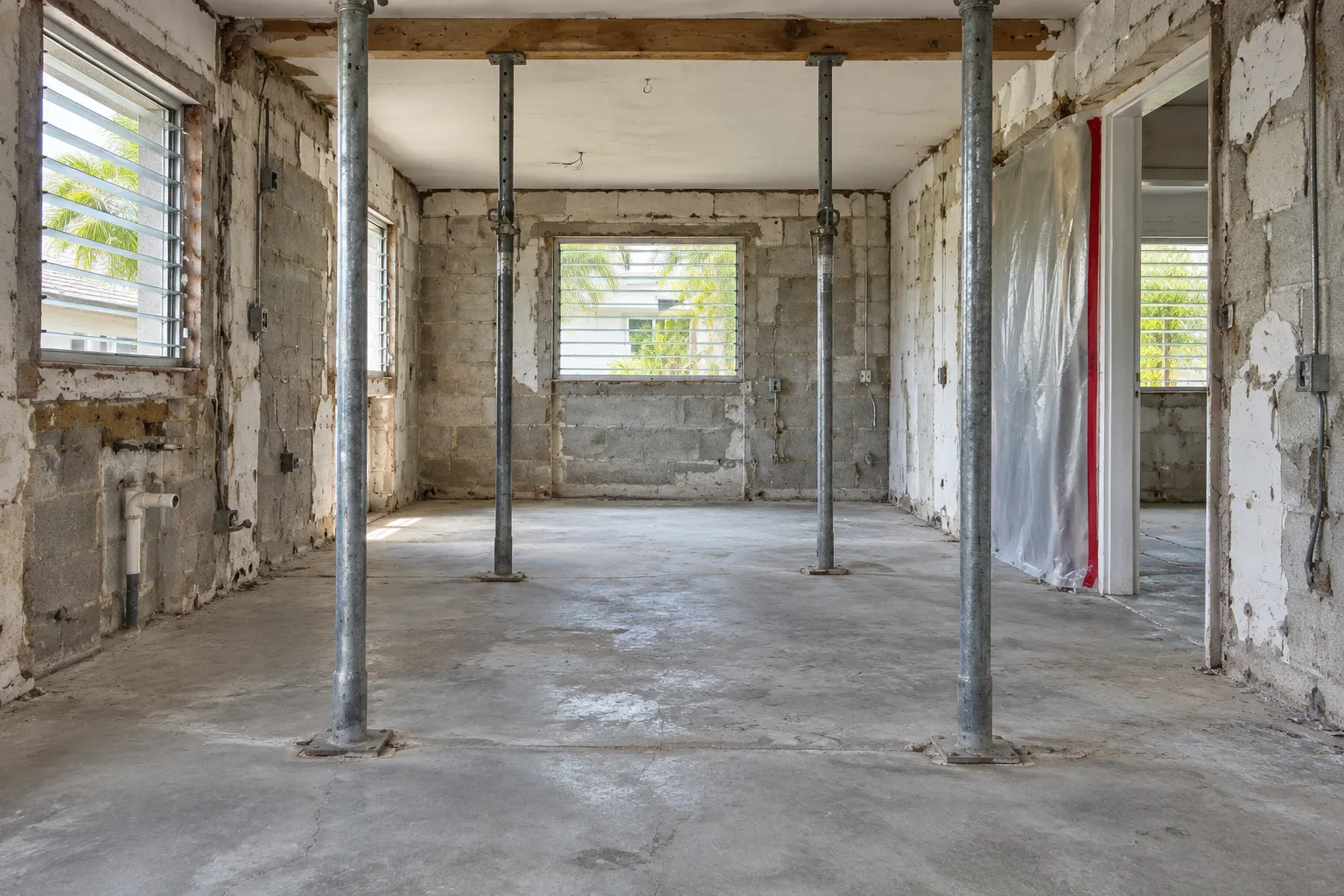 Gutted house interior down to block walls in Miami